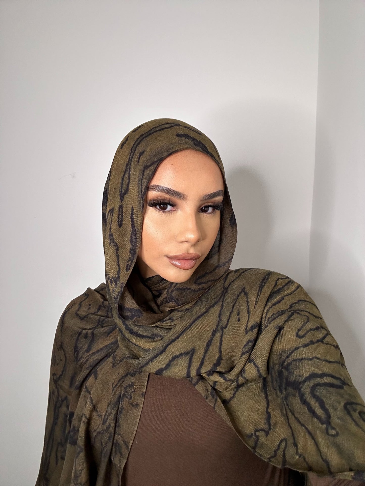 Fall leaves modal. One side brown one side green.