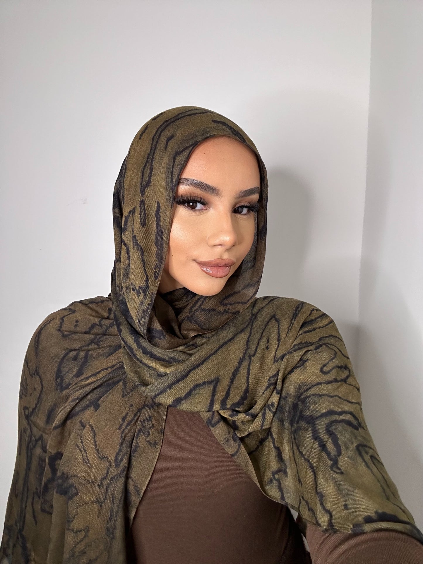 Fall leaves modal. One side brown one side green.